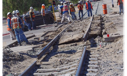 Repair work on RR crossing at Calle 13 today