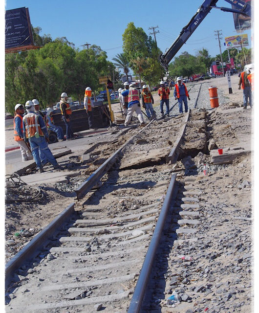 Repair work on RR crossing at Calle 13 today